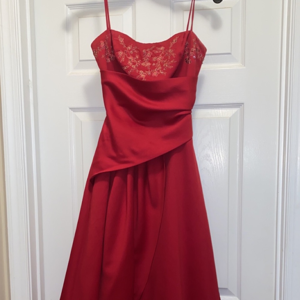 Beautiful red beaded formal dress with corset back! Worn once!